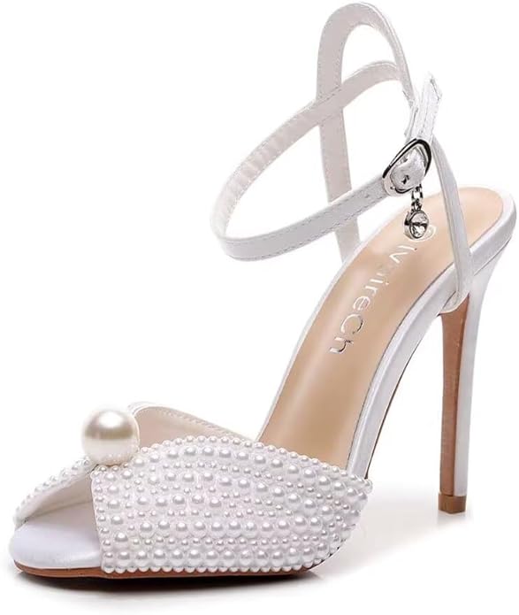 WHITE WEDDING SHOES BRIDAL HEELS. WHITE HIGH HEELS WEDDING. WEDDING SHOES SIMPLE. ELEGANT WEDDING SHOES BRIDES. BEAUTIFUL WEDDING SHOES BRIDES HEELS. BRIDAL WEDDING SHOES HEELS. WHITE BRIDAL HEELS. ELEGANT WEDDING SHOES HEELS. HEELS CLASSY. FANCY SANDALS. SILVER HEELS. PERFECT WEDDING SHOES. NUDE HEELS