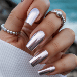 Mirror Shine Nails, Chrome Nails, and Opal Nails – The Ultimate Guide to Glossy, Glamorous Manicures There’s something irresistible about a manicure that shimmers like glass, catches the light from every angle, and turns heads with every gesture. Whether you’re reaching for a champagne flute, holding your phone, or brushing your hair behind your ear — mirror shine nails, chrome finishes, and ethereal opal designs make every movement magical.